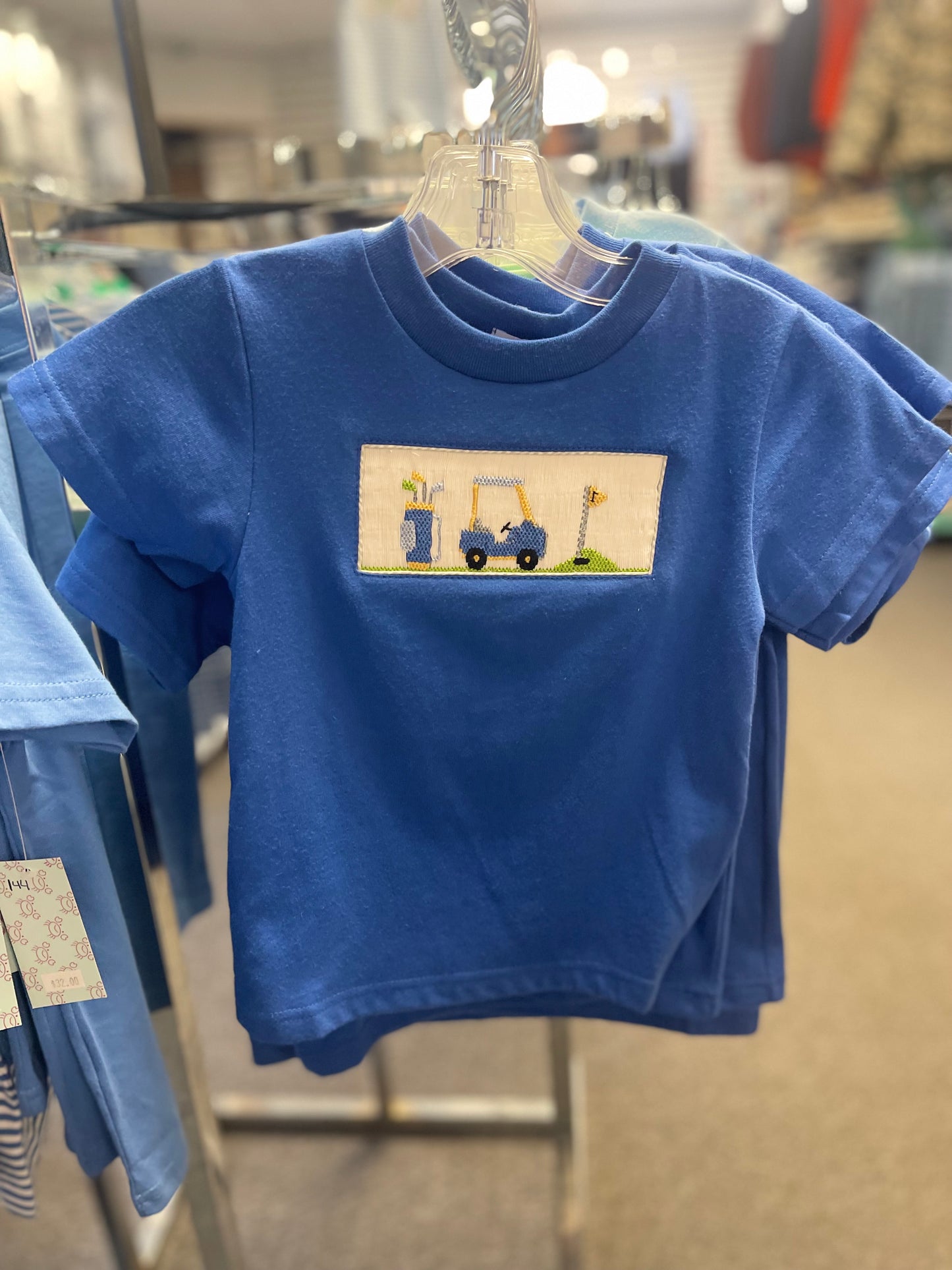 Golf cart tee smocked